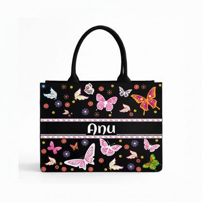 Personalized black butterfly tote bag with custom name Anu and colorful floral design
Custom name butterfly tote bag for women with vibrant butterfly and flower print
Women's personalized butterfly tote bag with colorful floral artwork and custom name
Stylish personalized black tote bag featuring butterfly print and custom name for women
Reusable personalized butterfly shoulder tote bag with floral design for everyday use
Front view of personalized butterfly tote bag with custom name and colorful butterfly 